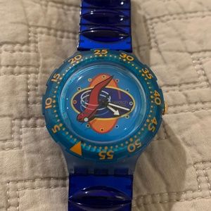 Vintage"scuba diver  style" Swatch watch..works well .awesome blue stretch band